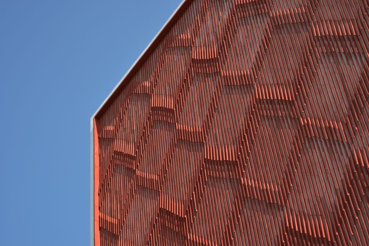 Clay roof tiles façade to minimize heat gain and has decorative function, at Vadodara, by Manoj Patel Design Studio 5