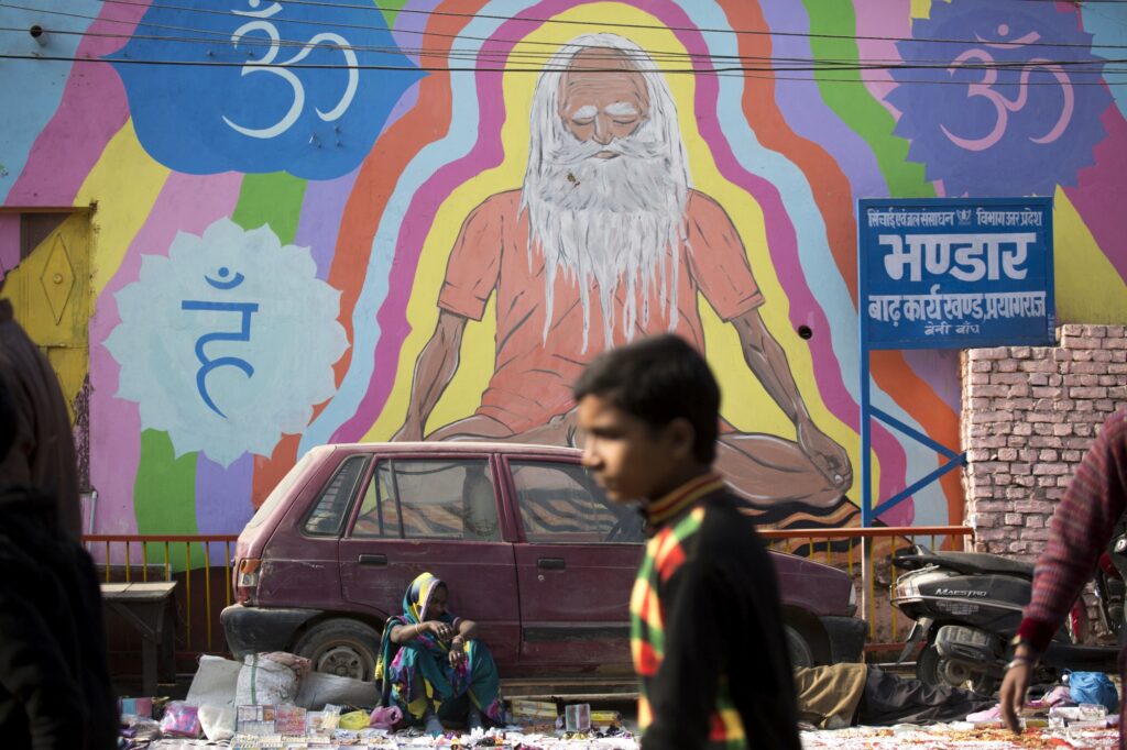 The wall painting in Allahabad city made as part of Kumbh Mela. The distinguishing characteristic of street paintings is that the architectural elements of the given space are harmoniously incorporated into the picture.
