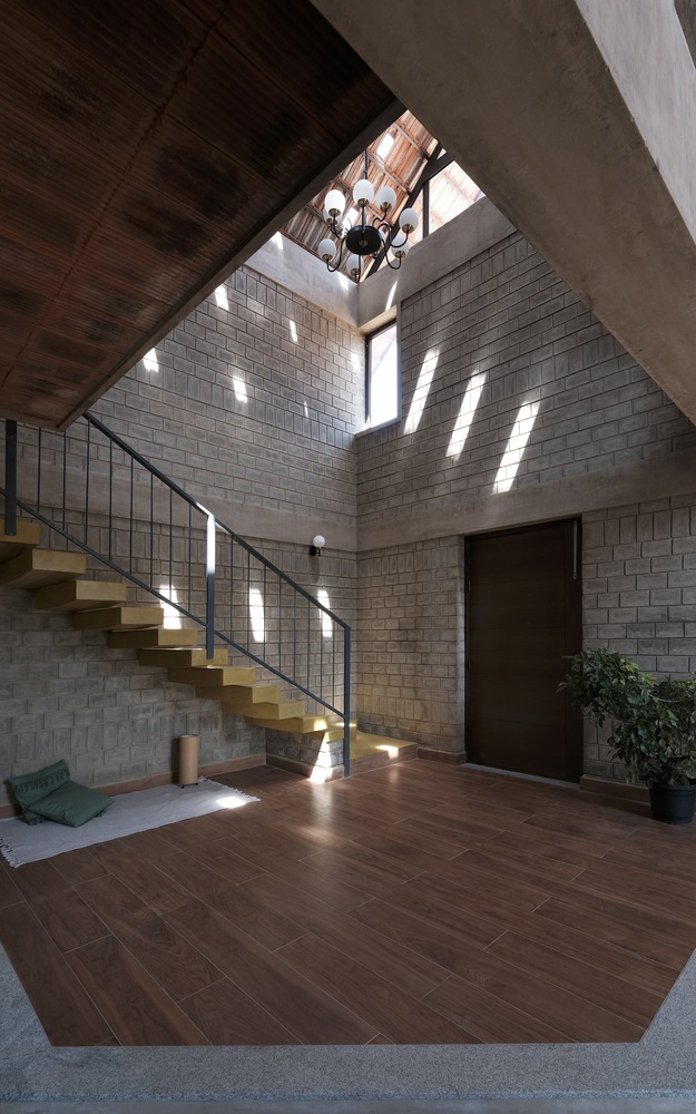 Interior. Boulder House, Shoolagiri, Tamil Nadu, by HabitArt Architecture. Photographs by GeoMorph Studio