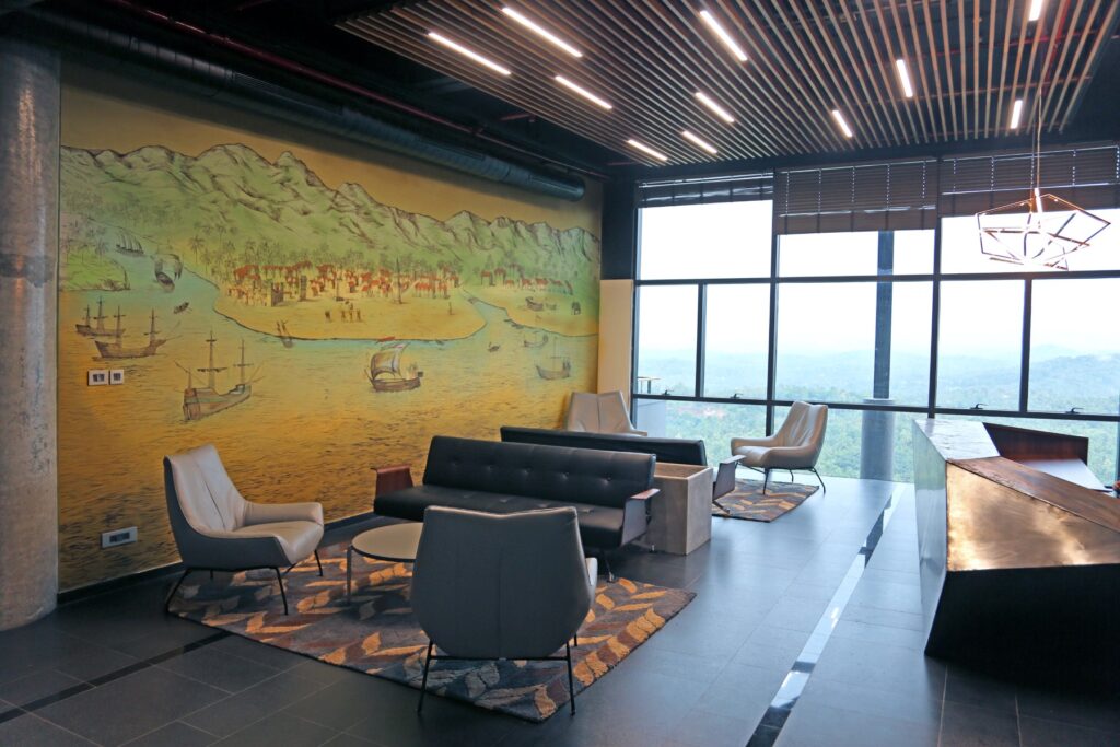 The executive floor lobby with a view of the distant hills, Malabar Headquarters, Calicut, Kerala, by Stapati. ©Tims Jose Kunnath, Sujith G S, Sahil