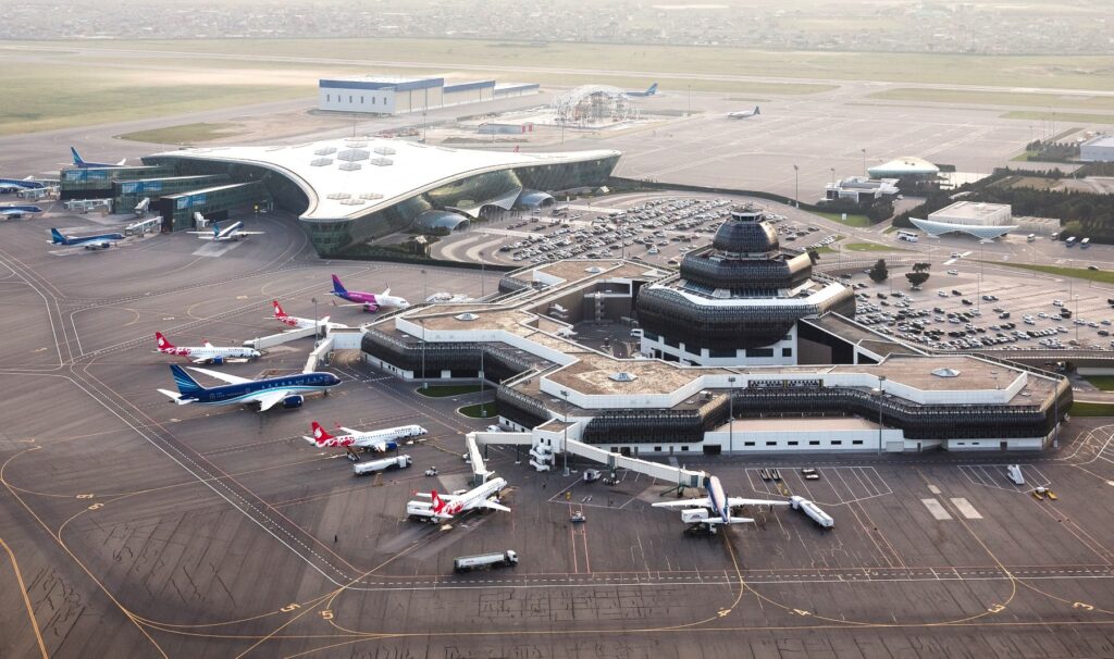 An imagery of the diversity of modern and traditional architecture approach in the design of the new and the old Baku air terminals respectively. © Anar Aliyer